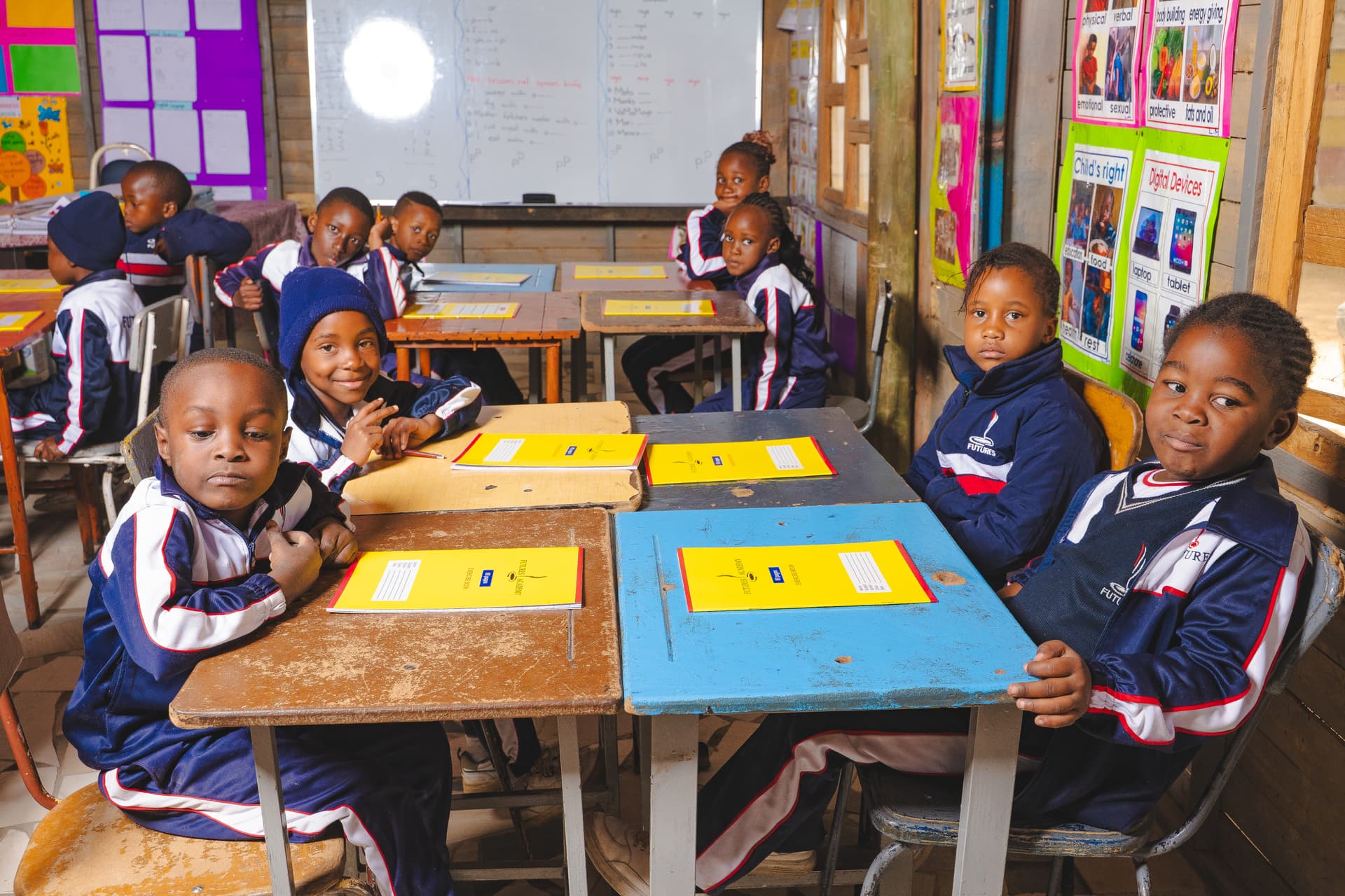 Grade 1-2 students smiling together