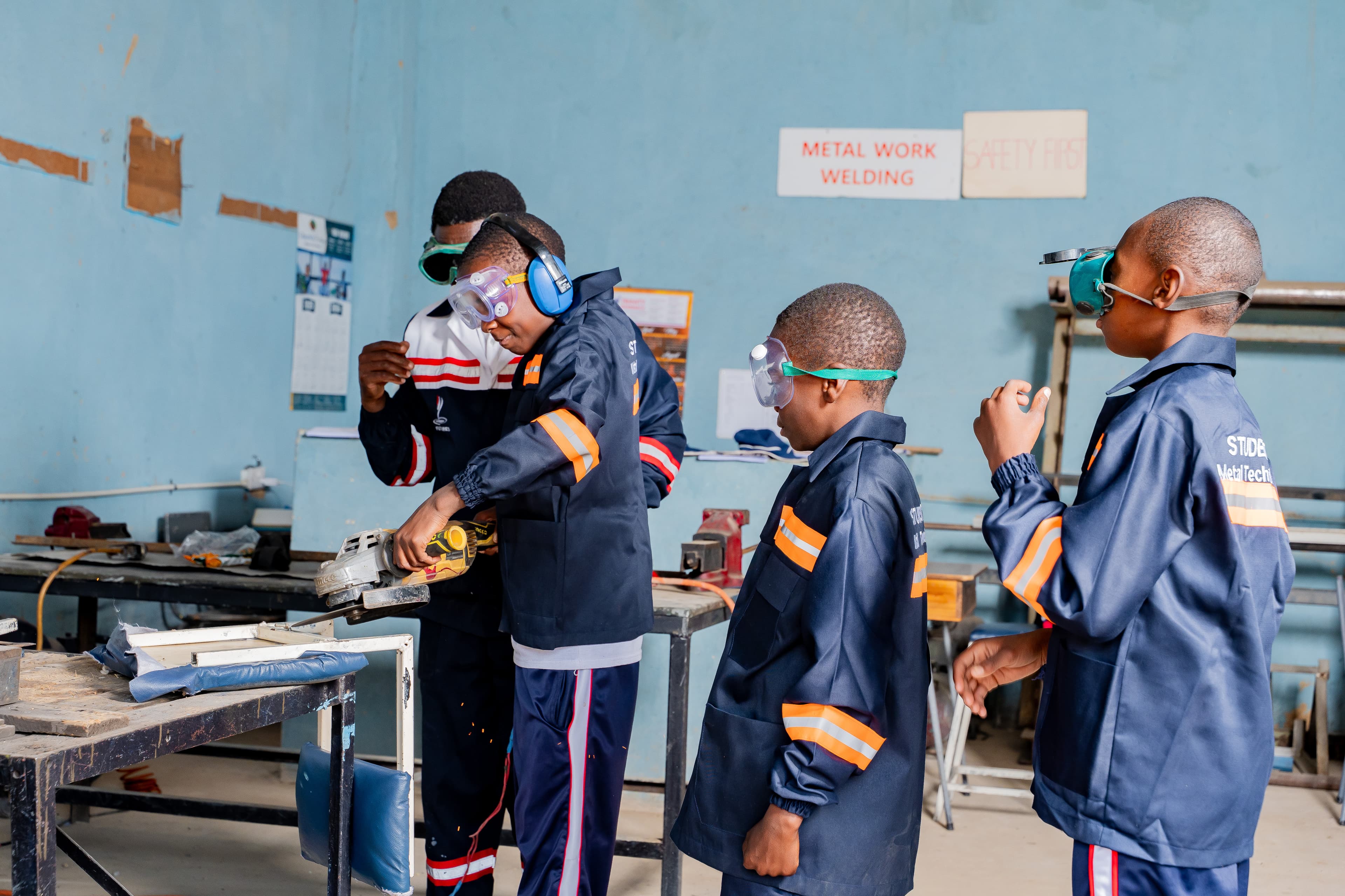 Students working on a metal work project